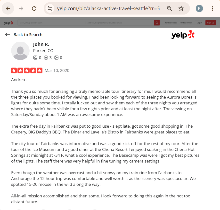 Screenshot of a Yelp review by John R. from Parker, CO, praising an Alaska travel tour arranged by Andrea.